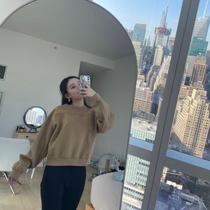 Uniqlo tan colored cropped sweatshirt in large